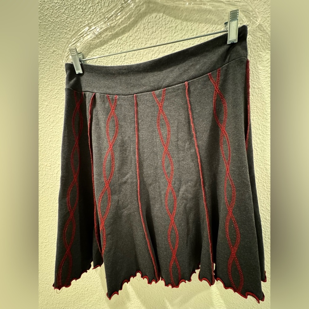 Beautiful dark gray skirt with bright red stitching. Size 12/14 large